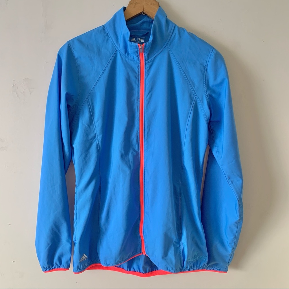 ADIDAS Women's Vibrant Blue Golf Wind Jacket with Pink Trim